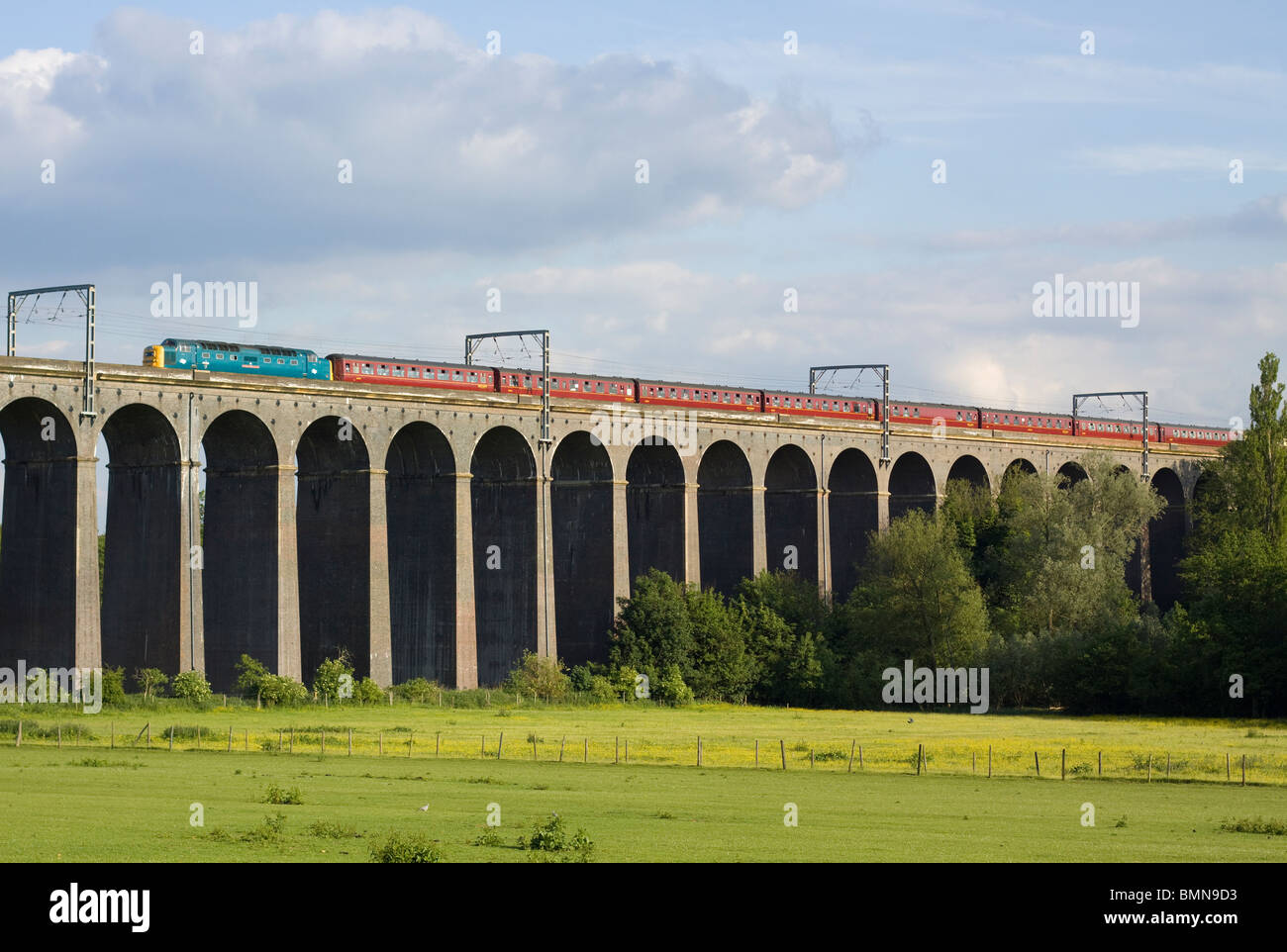 Class 55 Deltic number 55022 'Royal Scots Grey' hauling an enthusiast rail tour crossing over Welwyn Viaduct. Stock Photo