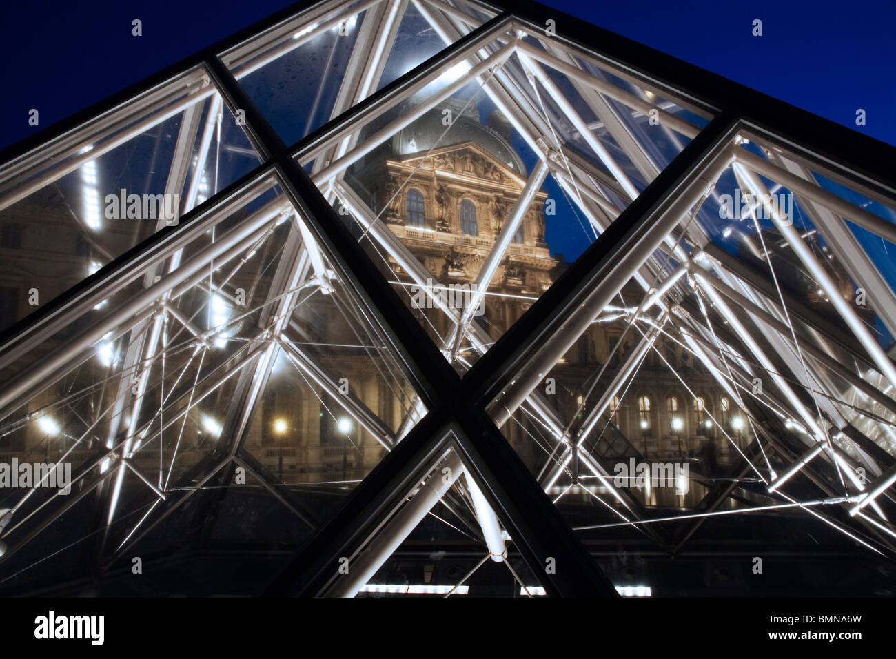 The Musee Du Louvre Pyramid with the Louvre Palais, Paris Stock Photo