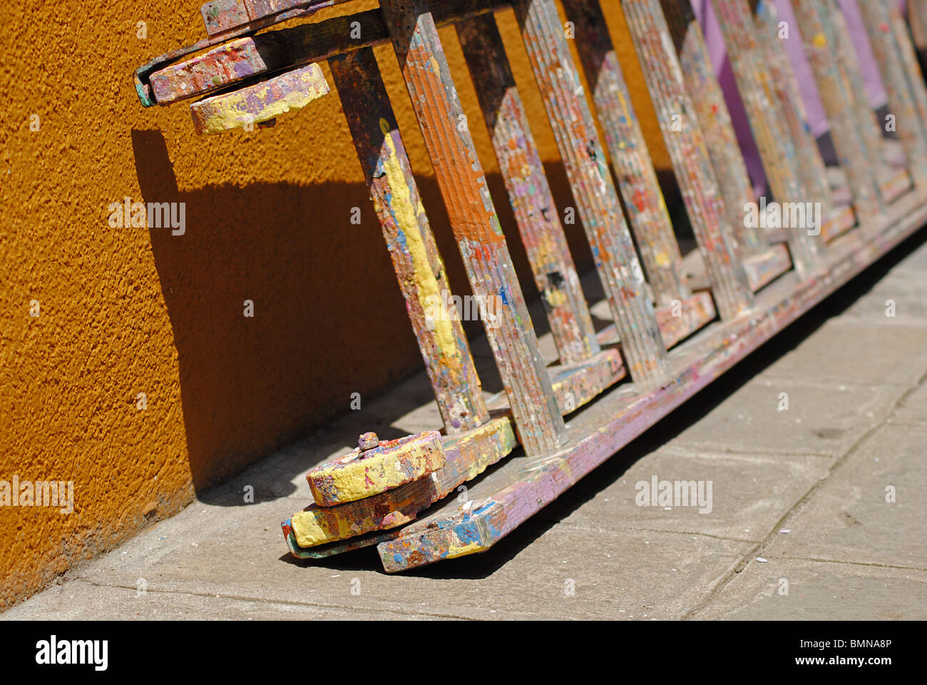 Ladder splattered with paint used for painting houses in Burano, Italy Stock Photo