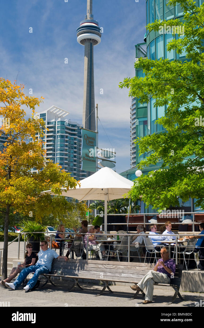 Cafe patrons and pedestrians at Queen's Quay, Toronto. Harbourfront