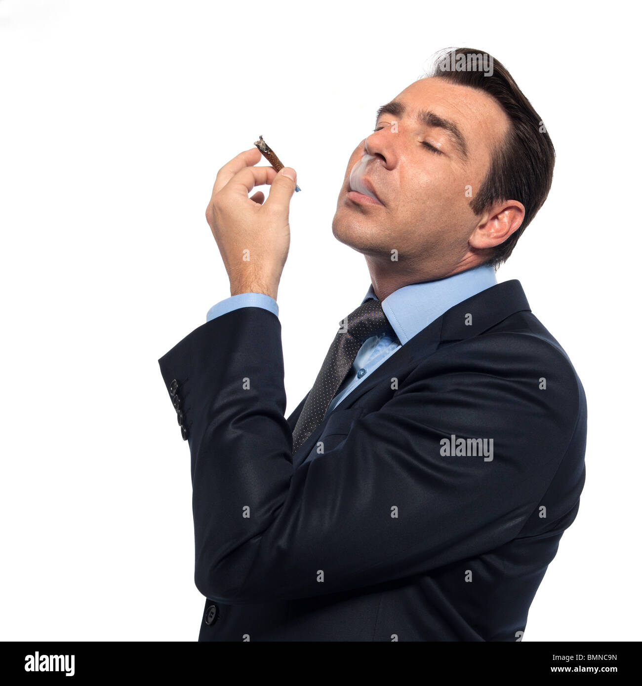 man businessman smoking drugs isolated studio on white background Stock Photo