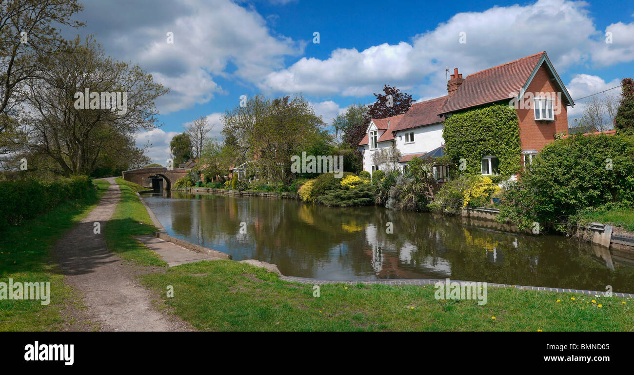 Houses next to canal or river Stock Photo - Alamy