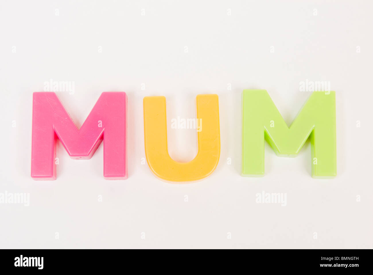 Colourful Toy Magnetic Alphabet Letters Spell Mum Isolated On White 