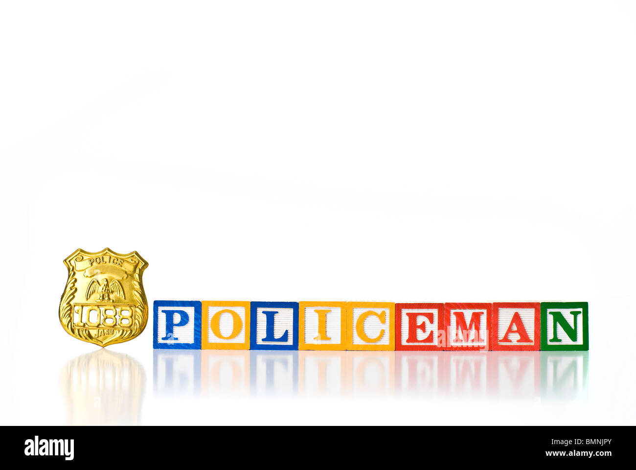 Colorful children's blocks spelling POLICEMAN with a badge Stock Photo