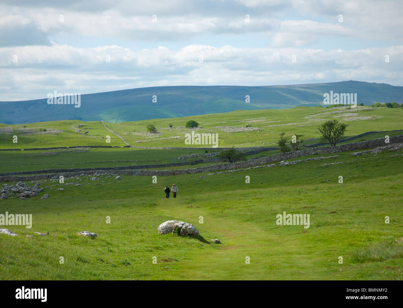 Two walkers on Dales Way near Grassington, Wharfedale, Yorkshire Dales National Park, England UK Stock Photo
