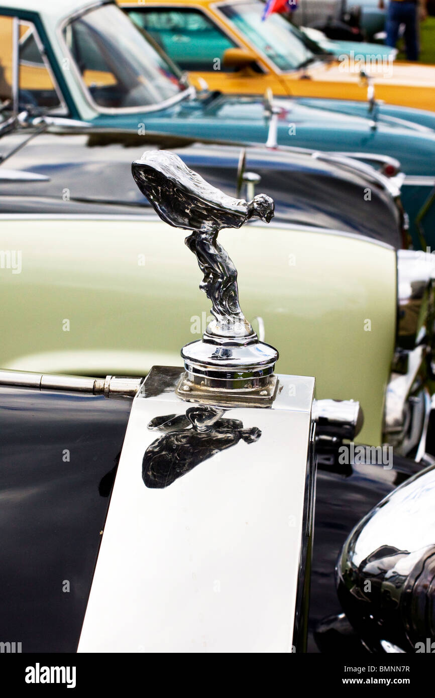 Classic British Car Hood Ornaments on a row of Classic British Cars Stock Photo