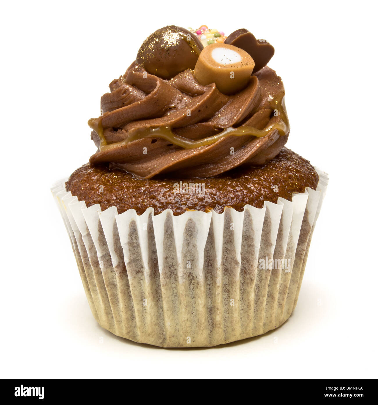 Luxury Chocolate Cup Cake from low perspective isolated against white background. Stock Photo