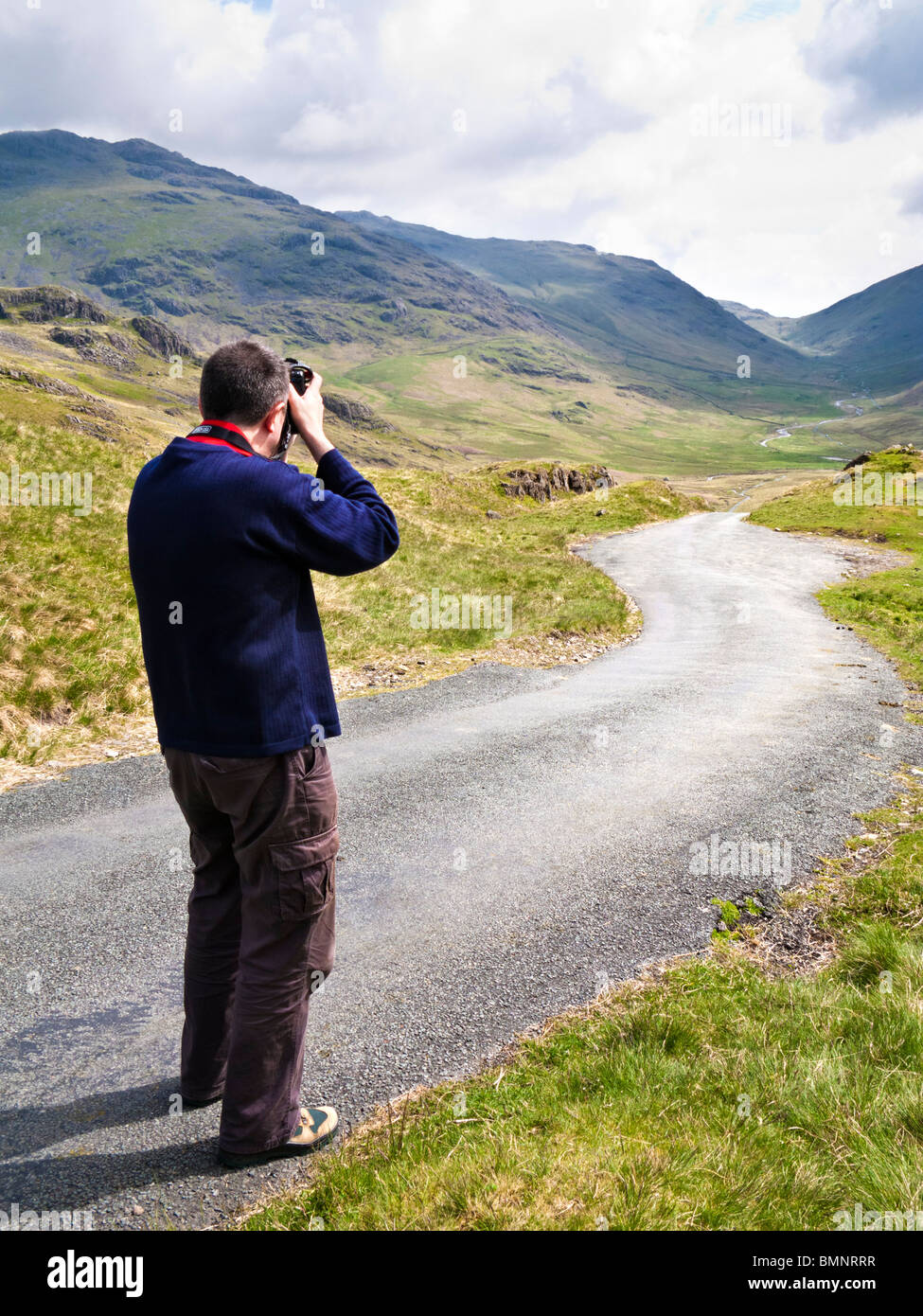 Tourist Photographer in The Lake District England UK - MR Stock Photo