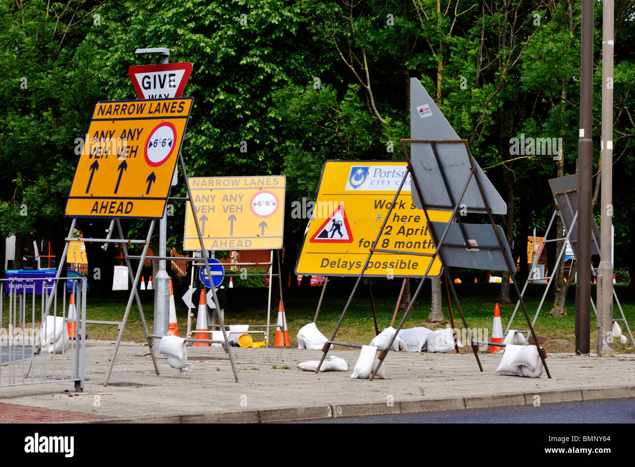 many road signs at a roadworks site Stock Photo