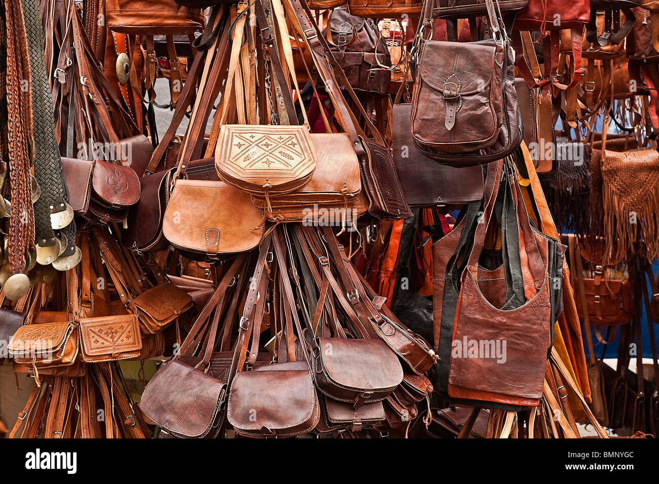 Leather goods for sale in an outdoor market, Madrid, Spain Stock Photo