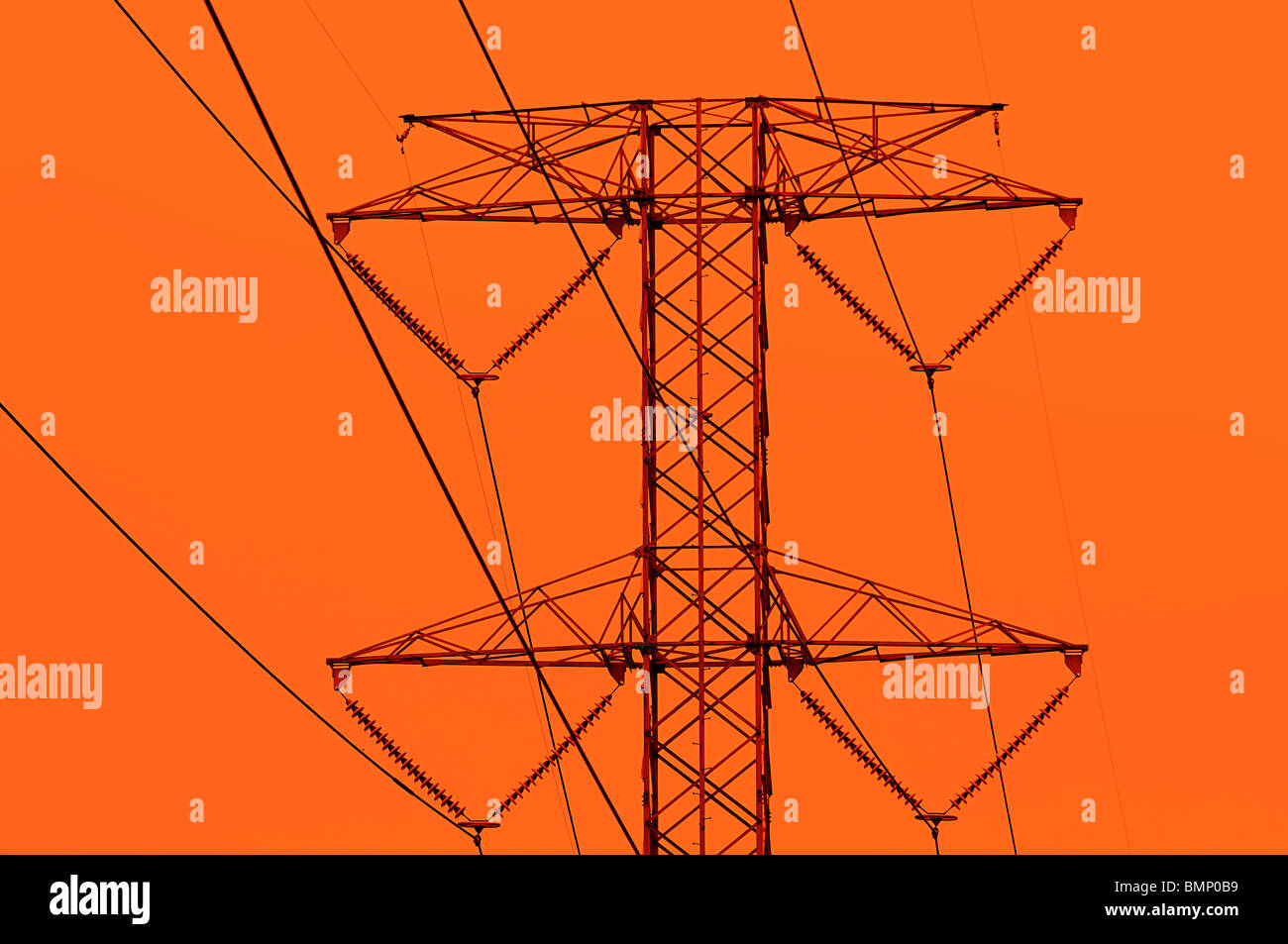 High Voltage Transmission Tower at sunset Stock Photo - Alamy