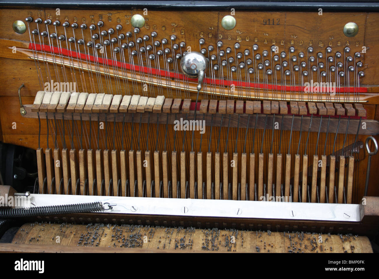 Detail of player piano driven by pinned wheel. Stock Photo