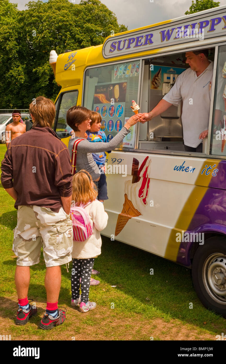 London, UK, Family Buying Ice Cream Cones from Ice Cream Truck in Park
