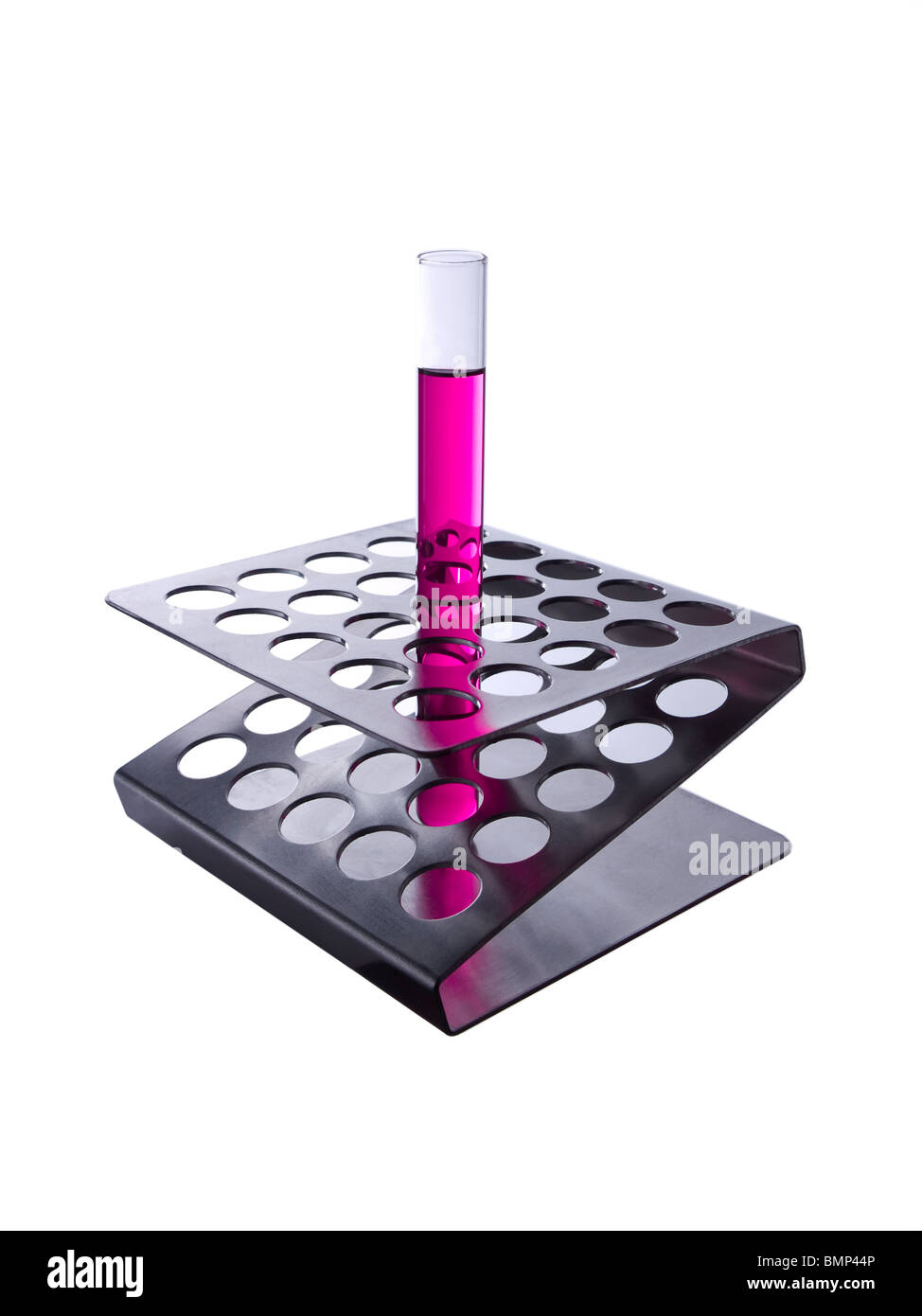 Test tube filled with a magenta liquid on a metallic rack. Isolated on white. Stock Photo