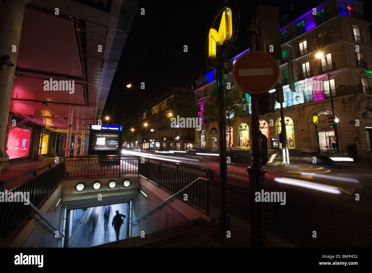 Boulevard Haussmann and a Metro station in front of the Galeries ...