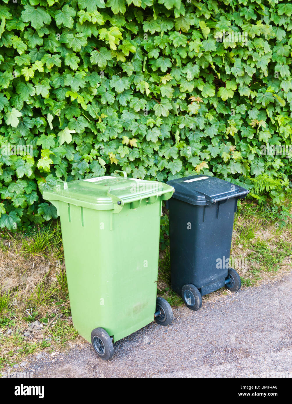 Two wheelie recycling bins England UK Stock Photo