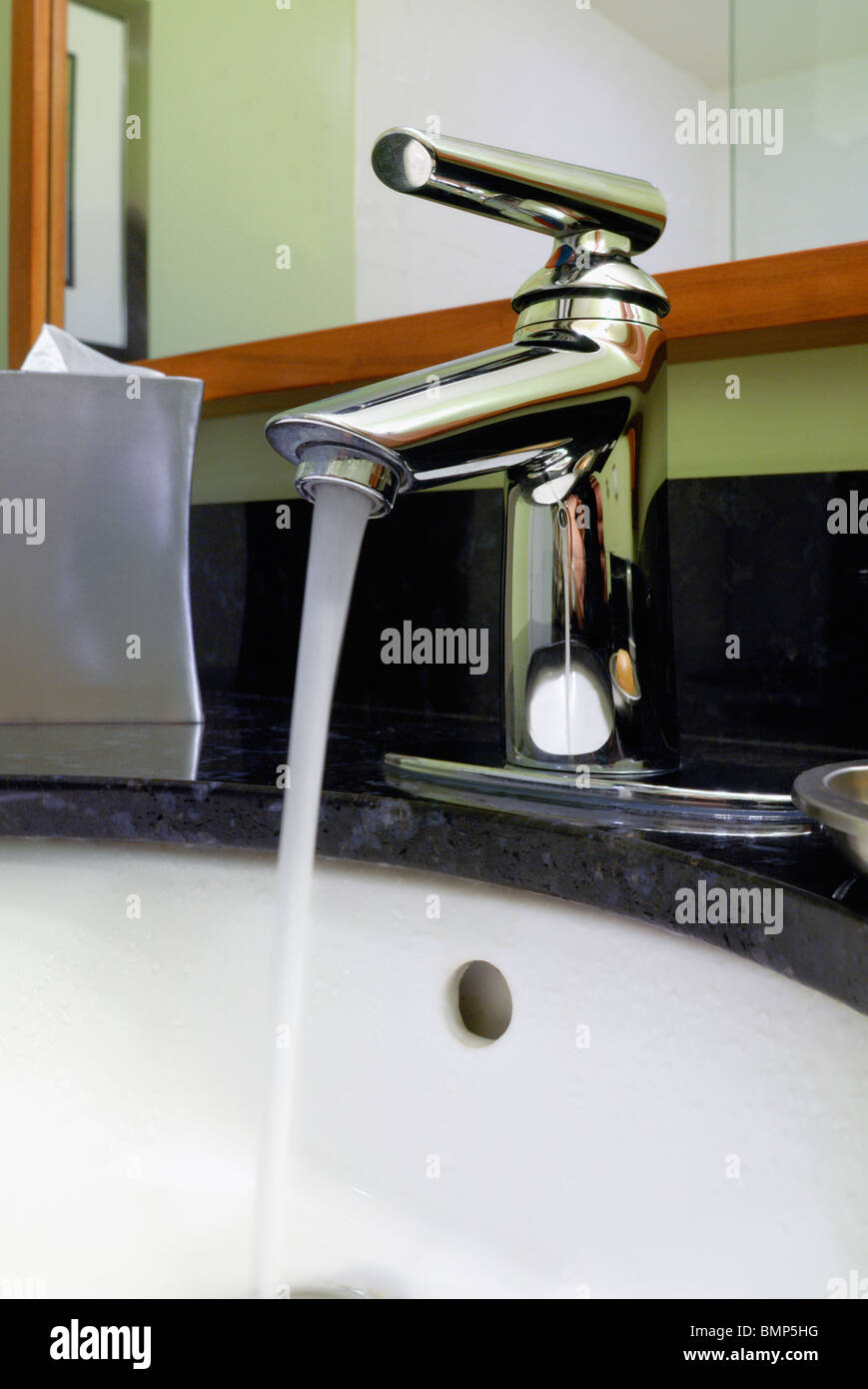 Running water at the bathroom sink Stock Photo Alamy