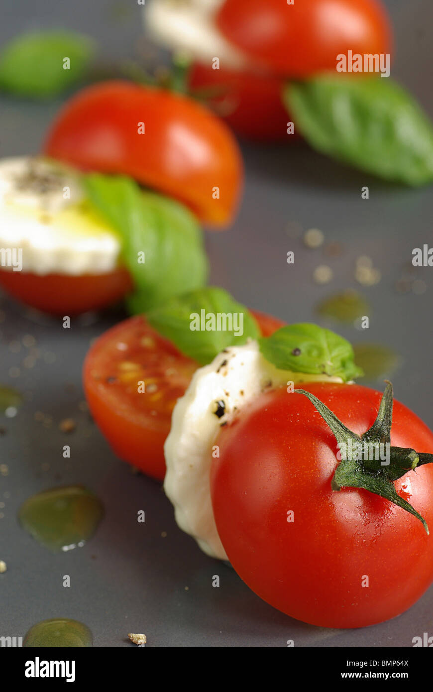 Tomato and mozzarella salad basil leaves hi-res stock photography and ...