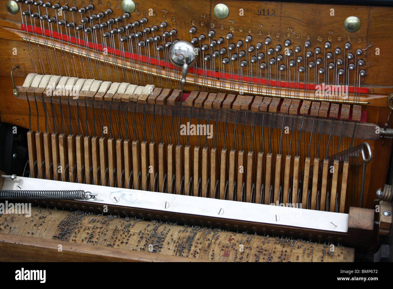 Detail of player piano driven by pinned wheel. Stock Photo