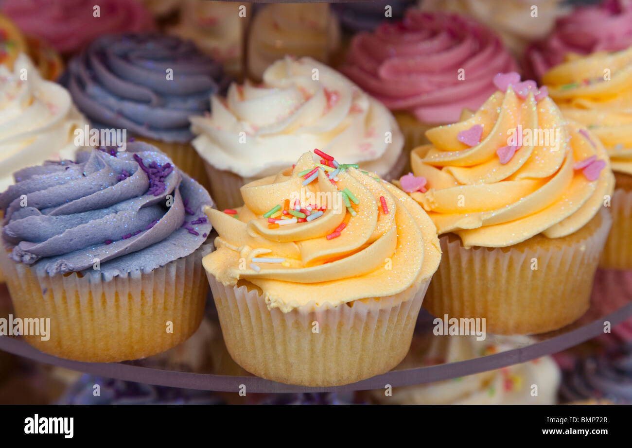 Stack of cup cakes with sugar icing Stock Photo