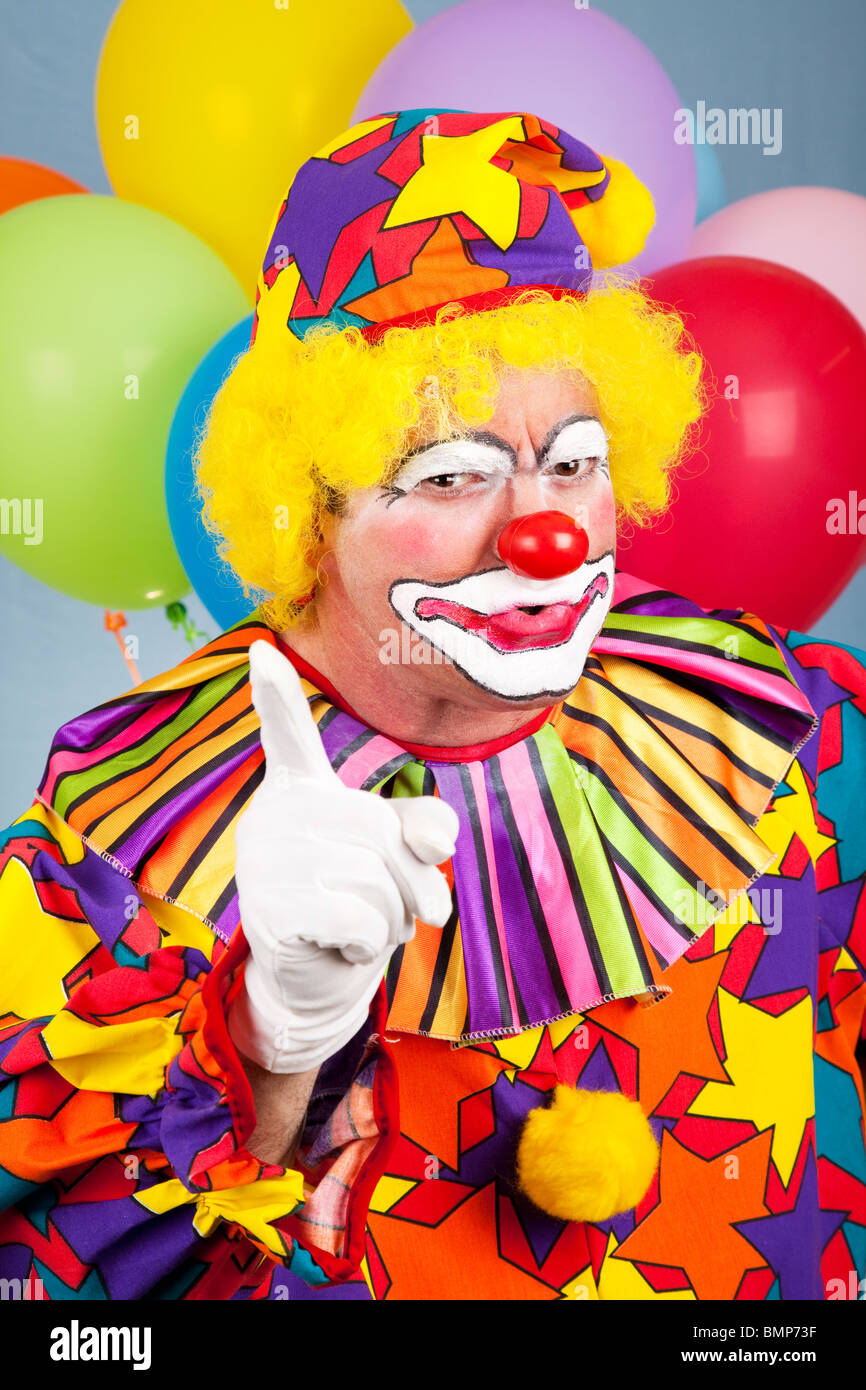 Mean angry clown shaking his finger and frowning Stock Photo - Alamy