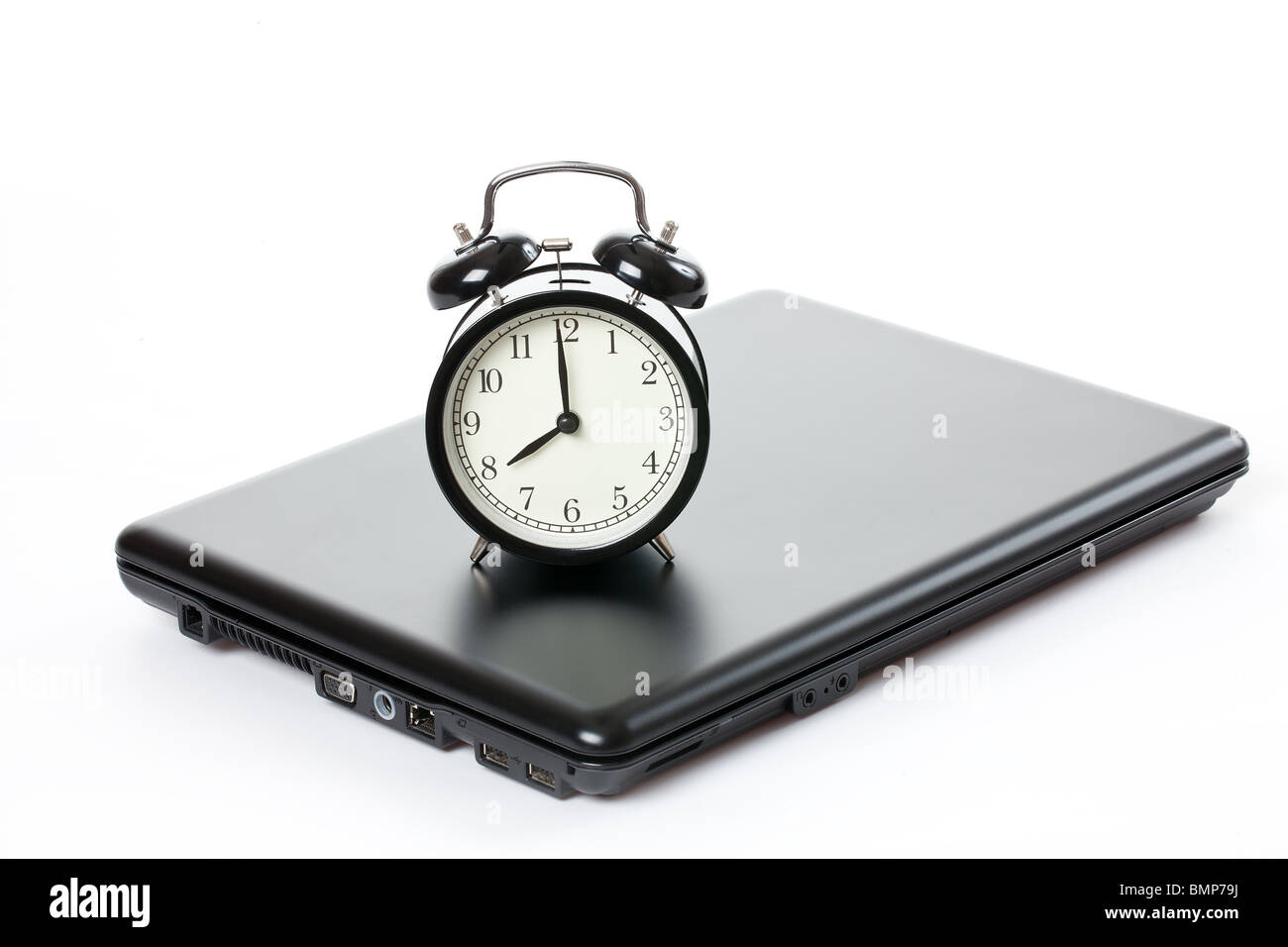 alarm clock and laptop on white background Stock Photo Alamy