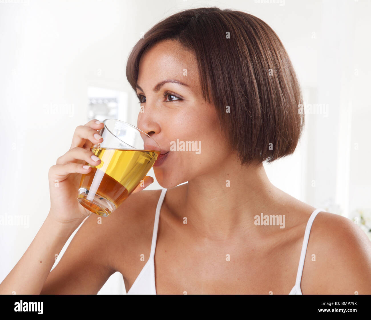 https://c8.alamy.com/comp/BMP79X/woman-drinking-apple-juice-BMP79X.jpg