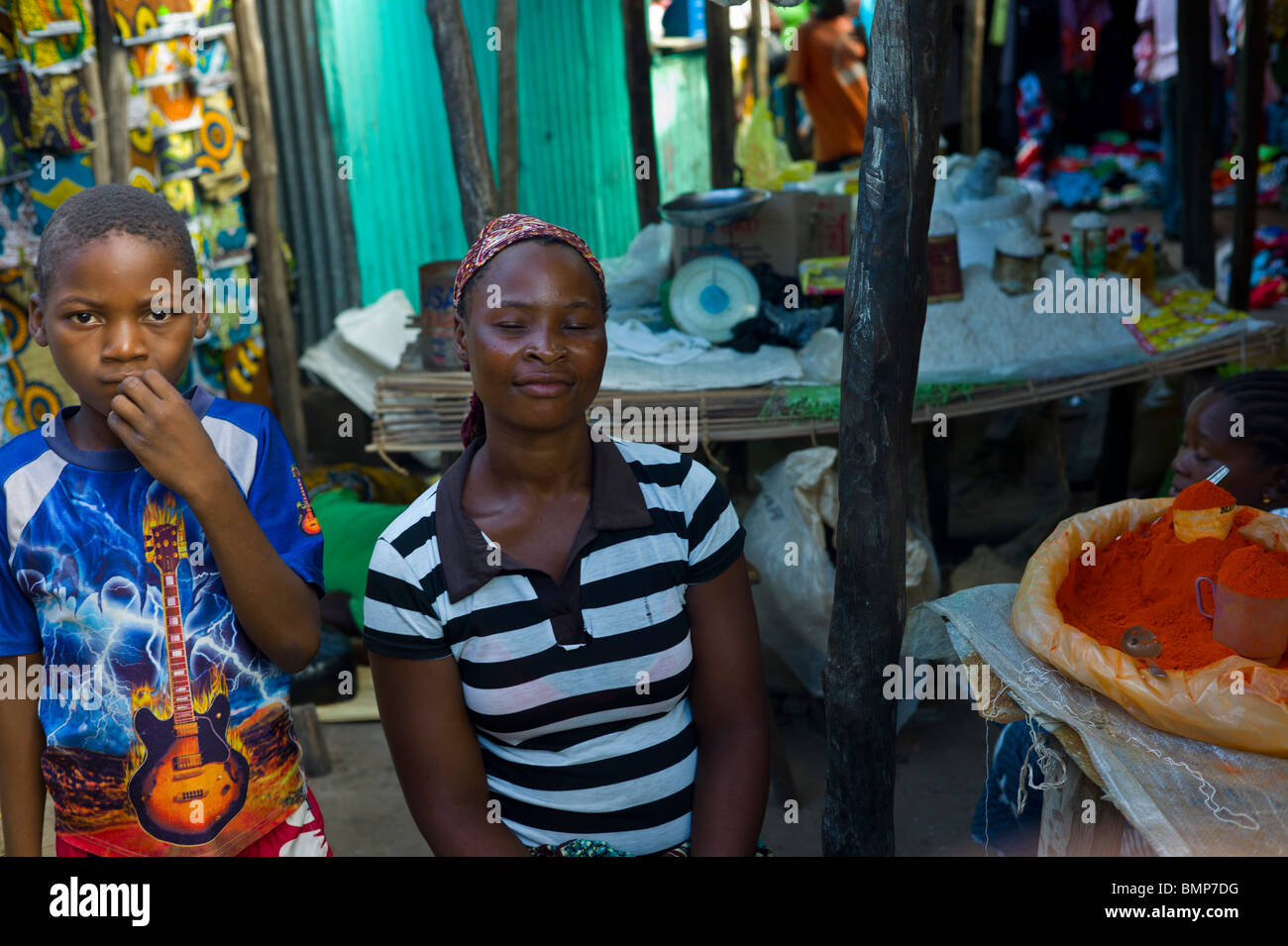 Mother and son at the market of Vilanculos (Vilankulo), Inhambane Province, Mozambique, Africa. Stock Photo