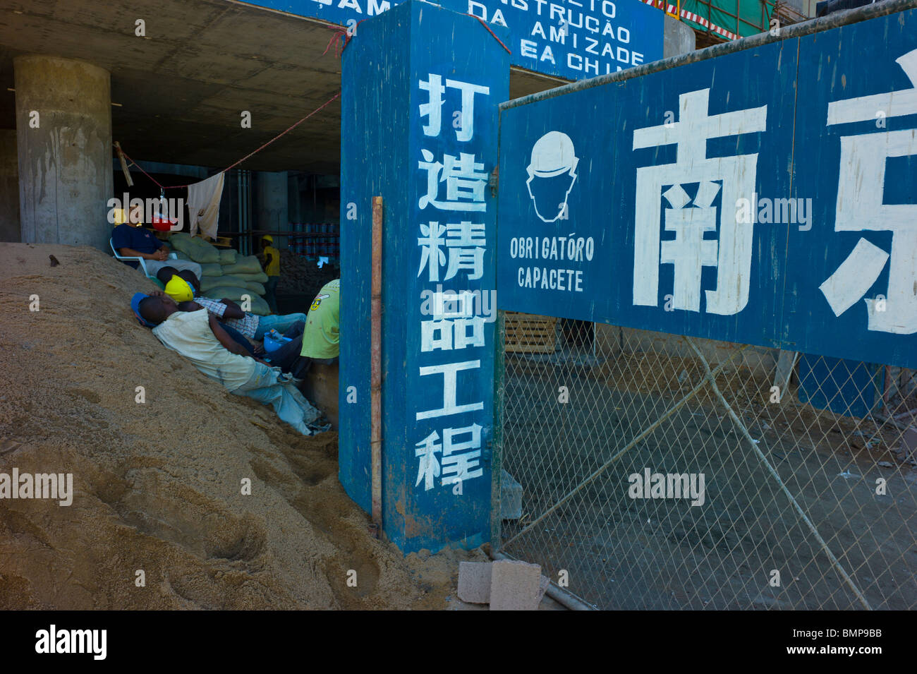 African workers on a chinese construction site in Maputo, Mozambique. Stock Photo