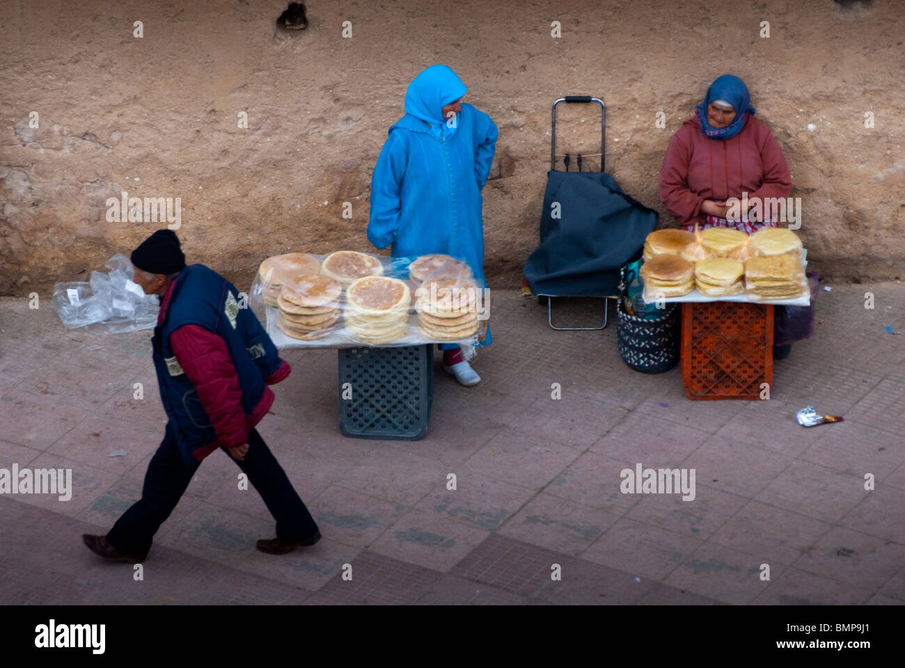 Moroccan women selling bread next to Sidi Abdelwahab gate, Oujda, Oriental region, Morocco. Stock Photo