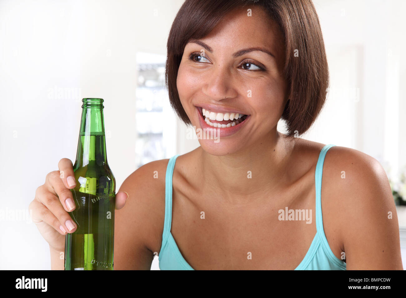 Girl drinking beer from bottle hires stock photography and images Alamy