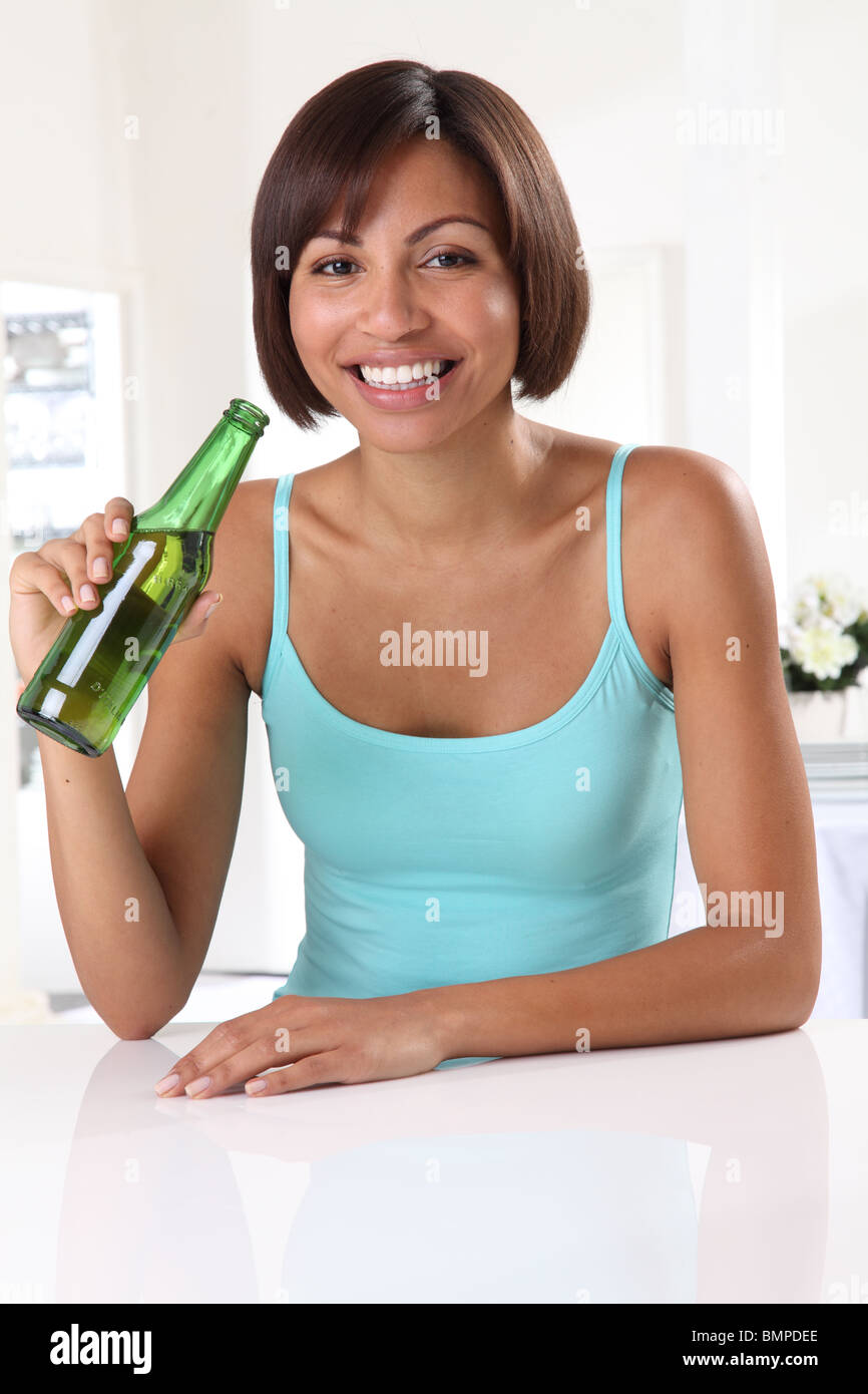 WOMAN DRINKING BEER FROM BOTTLE Stock Photo Alamy