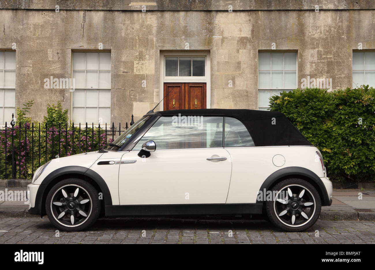 BMW Mini One Sidewalk soft top cabriolet car parked in the Royal Crescent Bath England Stock Photo