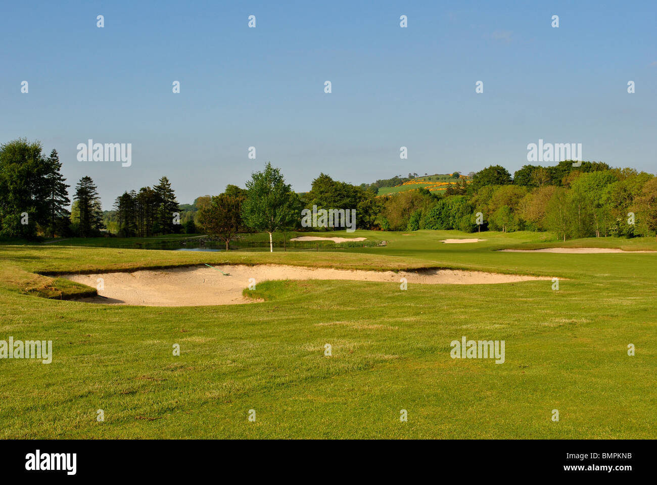 bunkers on a golf course Stock Photo