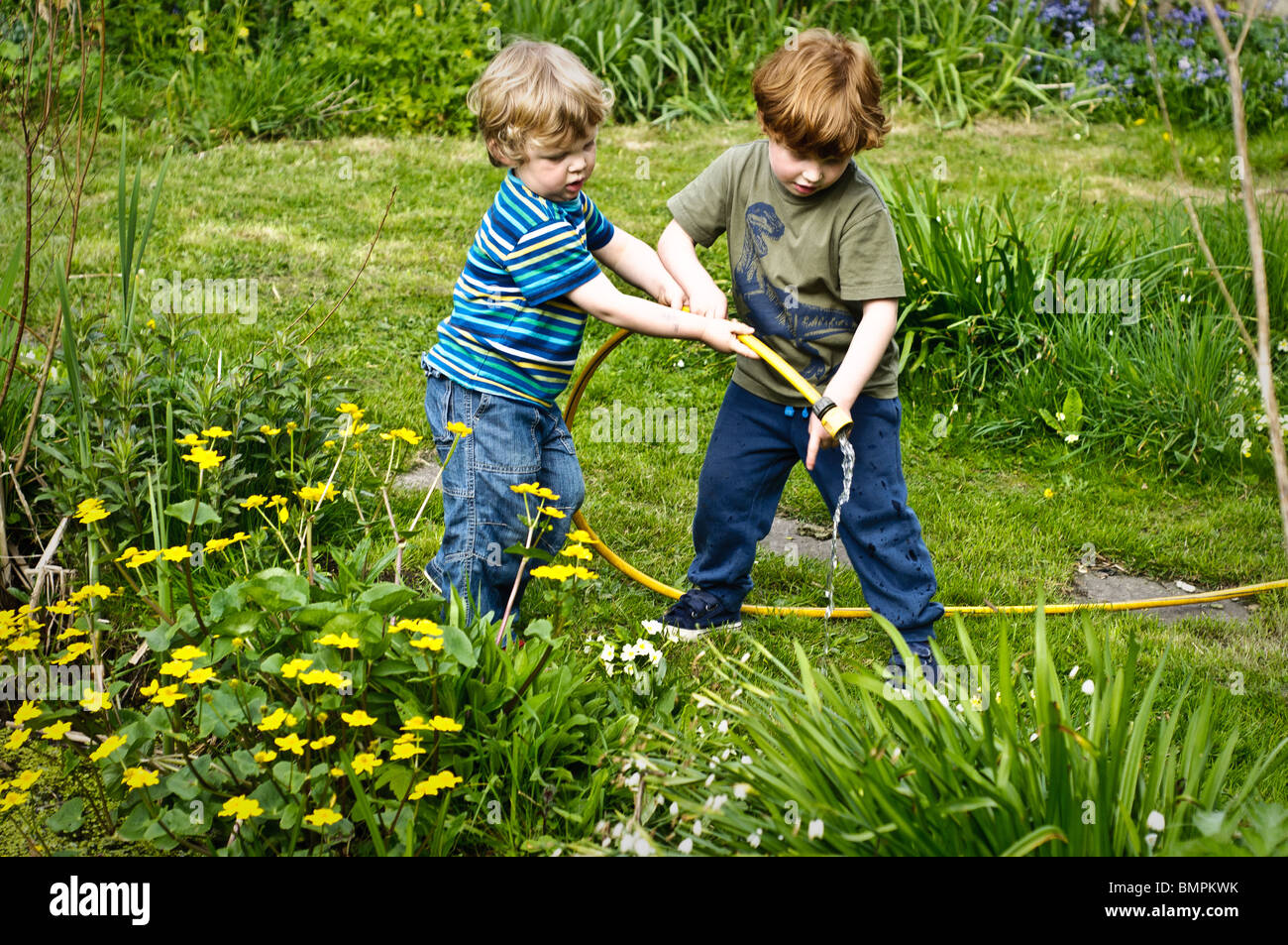 Child filling pond hires stock photography and images Alamy