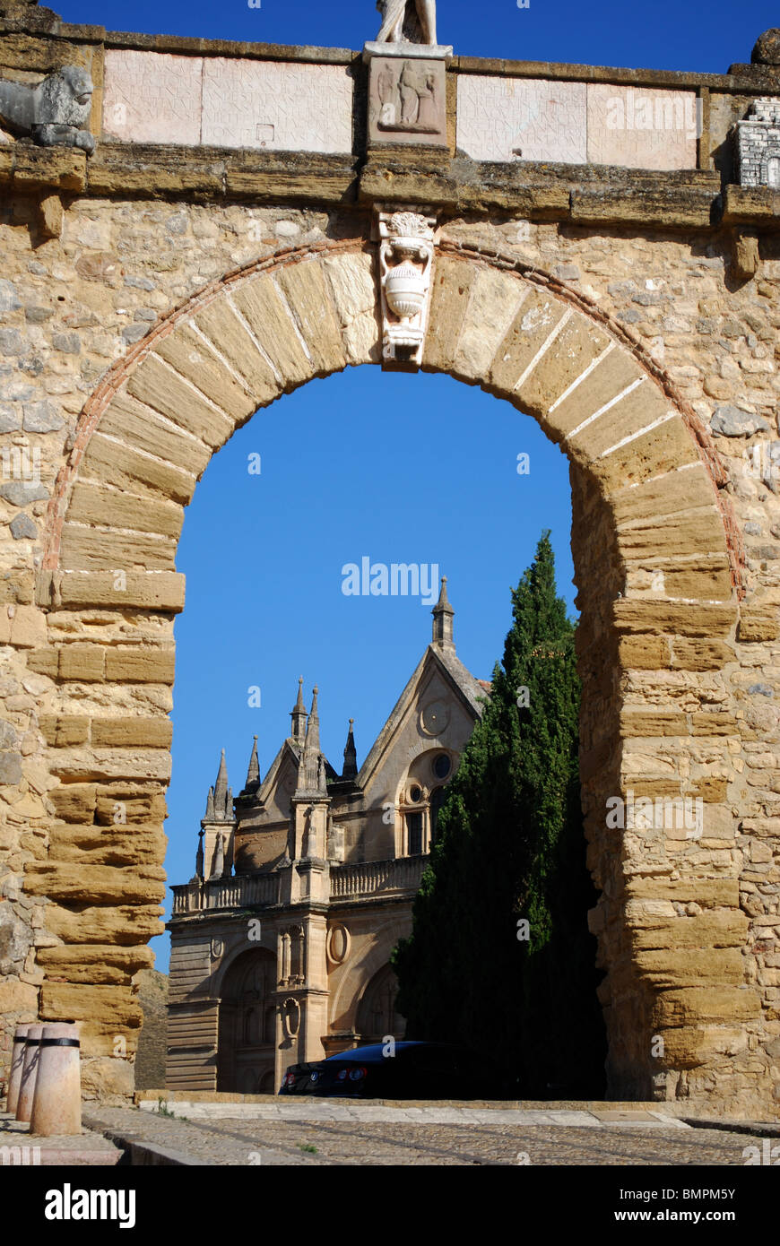 Statue of Pedro Espinosa in the Plaza de Santa Maria with a pavement cafe  and the giants arch to the rear, Antequera, Spain Stock Photo - Alamy