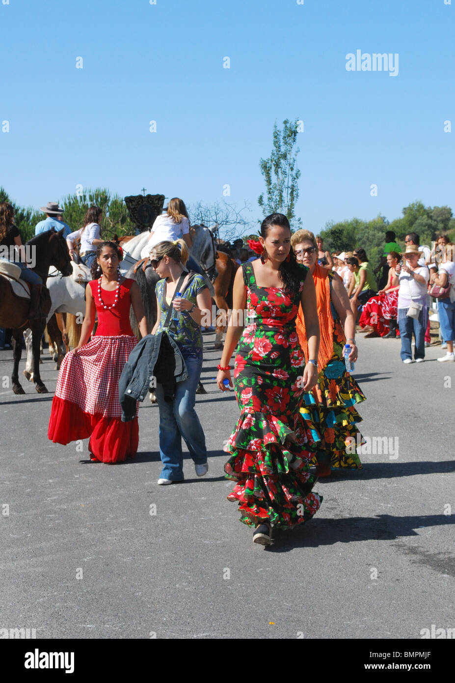 Women in traditional dress following procession, Marbella, Costa del