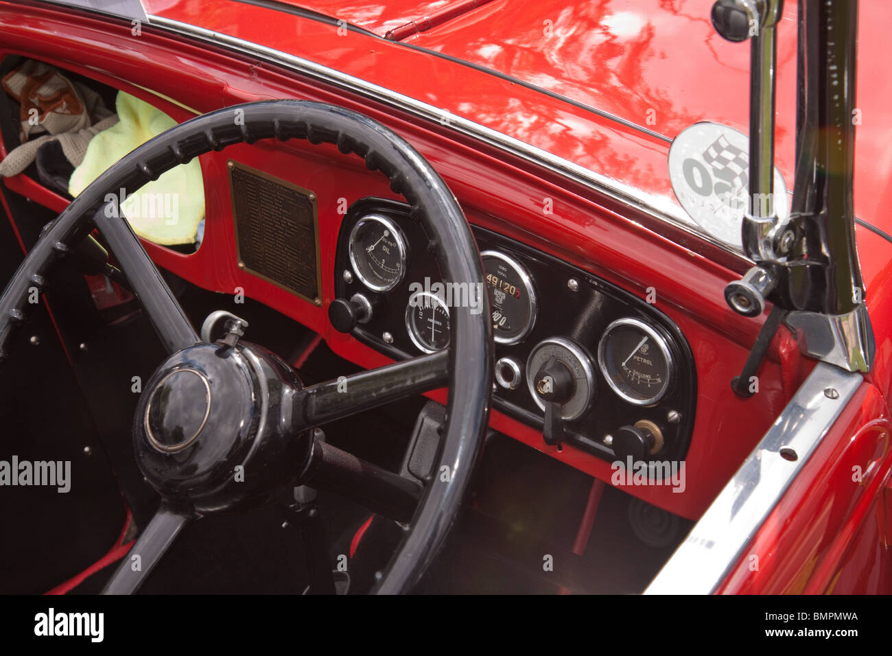Dashboard and steering wheel in a red Austin 7 classic car Stock Photo Alamy