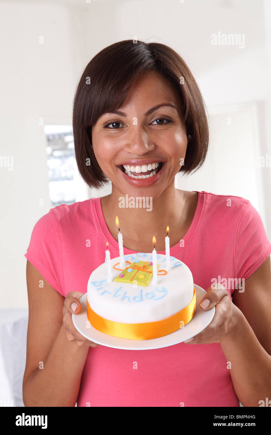 WOMAN WITH BIRTHDAY CAKE Stock Photo - Alamy