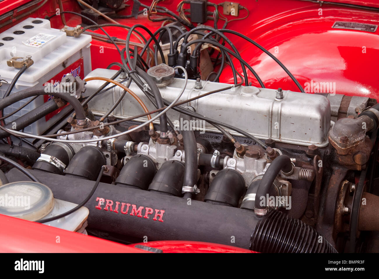 Triumph TR6 classic car six cylinder fuel injected engine Stock Photo