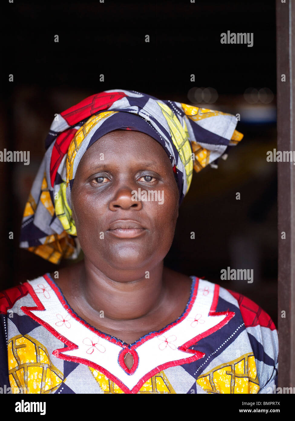 Black lady wearing colourful clothing after the Rwandan genocide Stock Photo