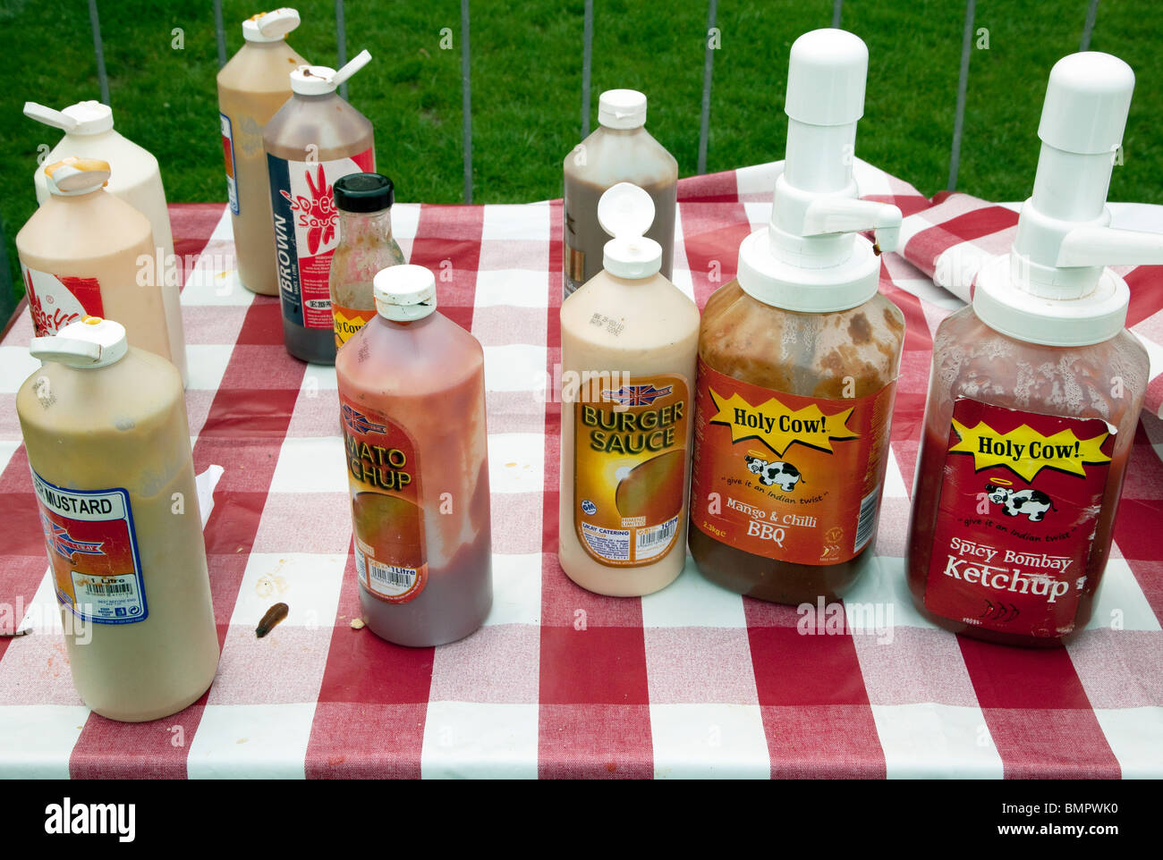Sauces on food stall at Camden Green Fair, London Stock Photo