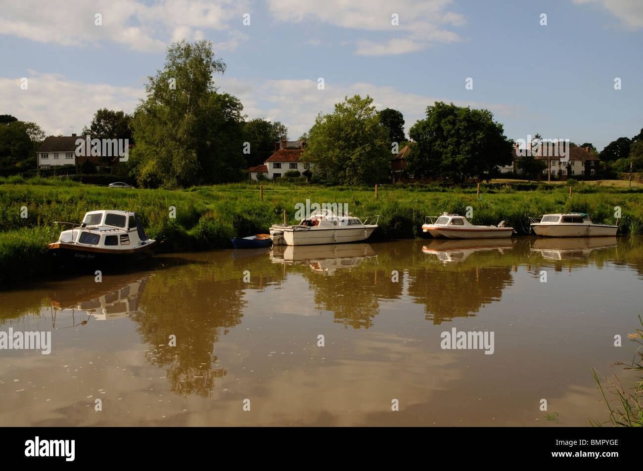 Boats alongside on the River Rother at Newenden Cranbrook Kent England UK Stock Photo
