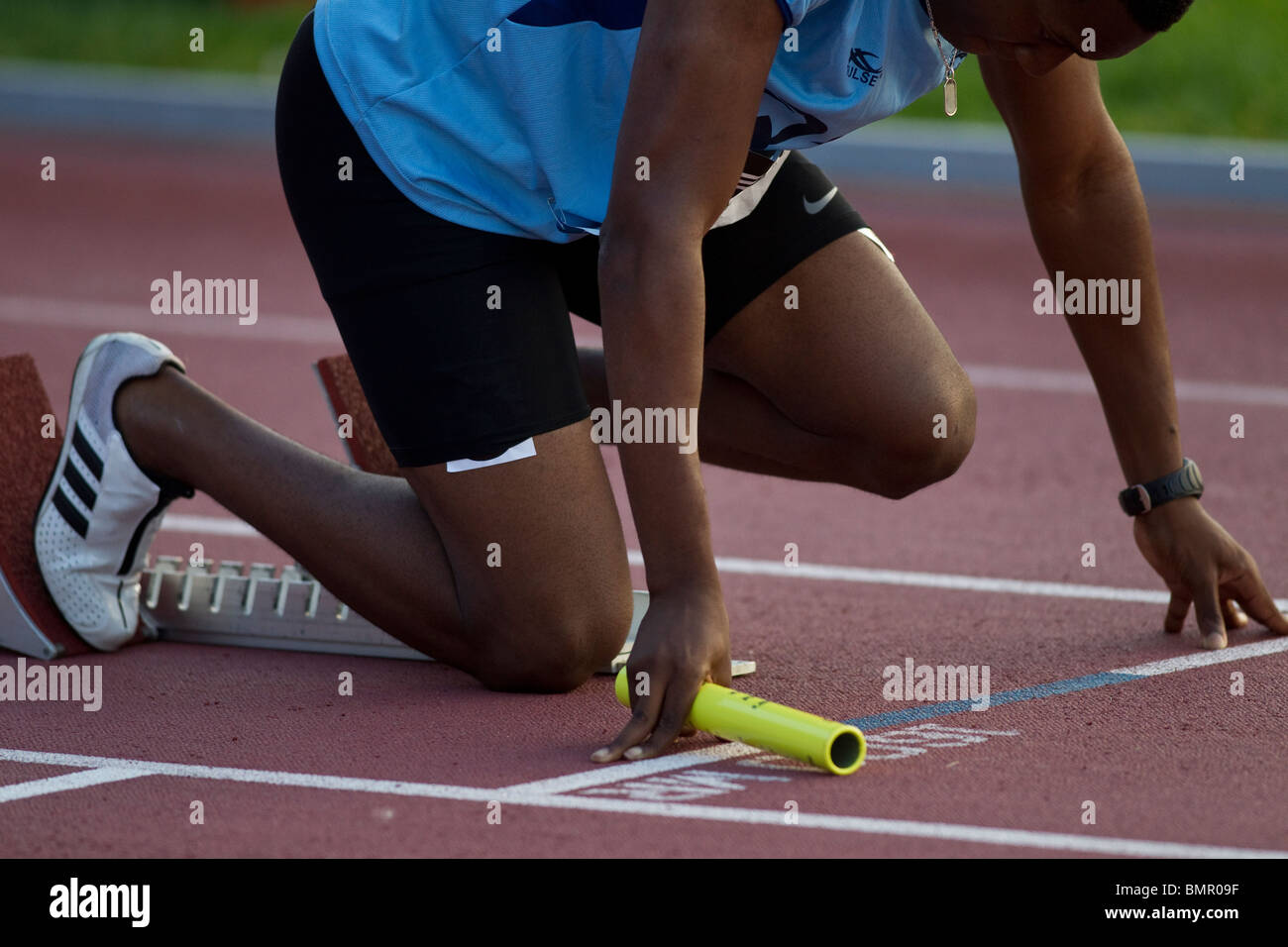 Detail of runner in starting blocks Stock Photo Alamy
