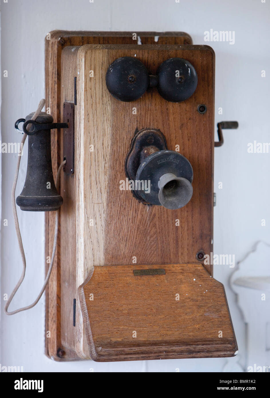 Old crank telephone at ranch in Hawaii Stock Photo