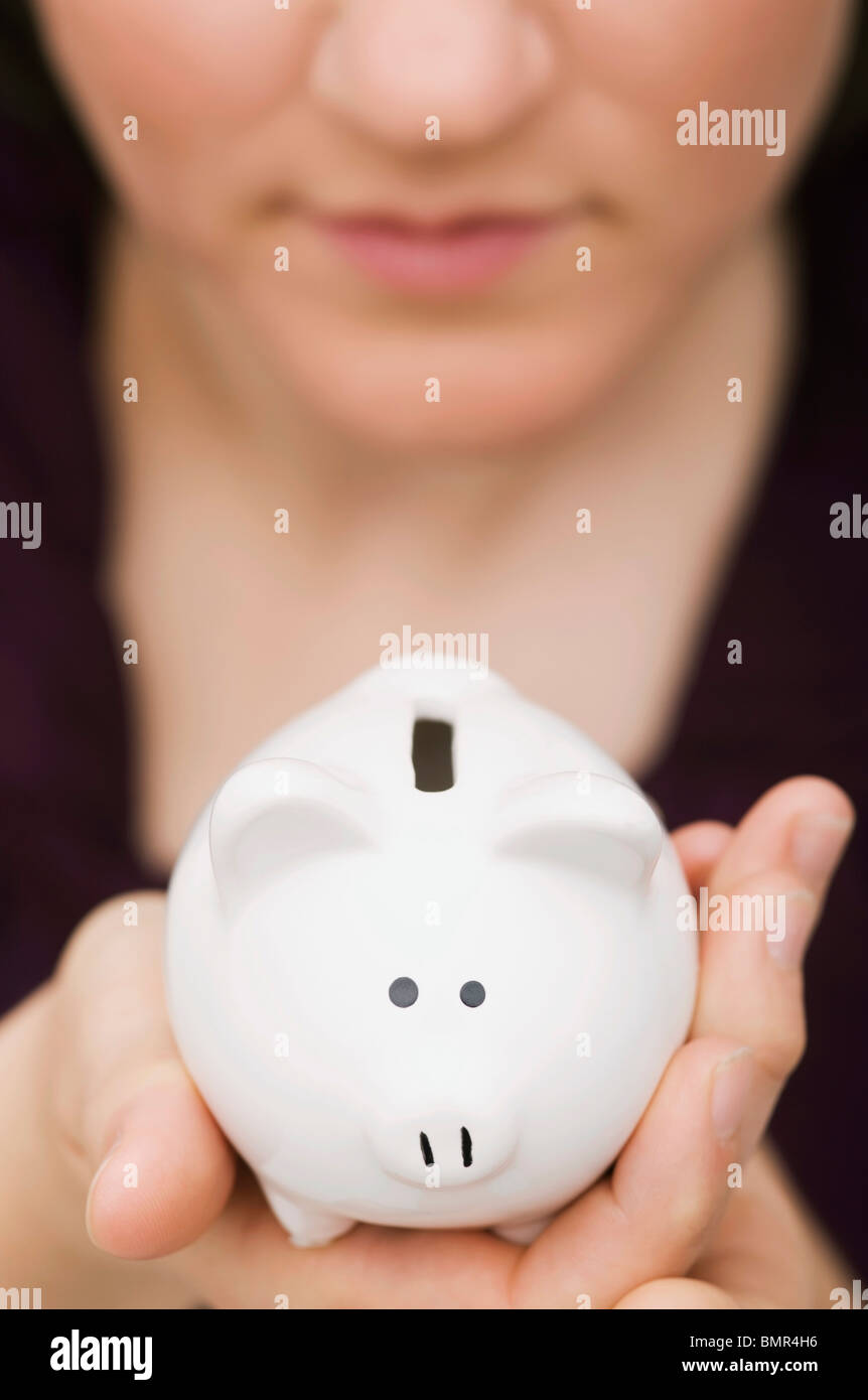 Woman With A Piggy Bank Stock Photo - Alamy