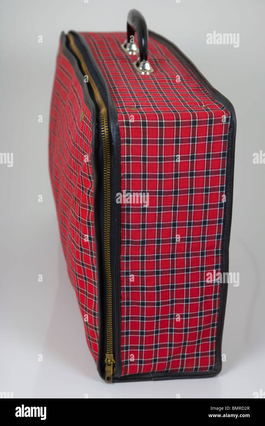 Red checked pattern suitcase on white background Stock Photo - Alamy