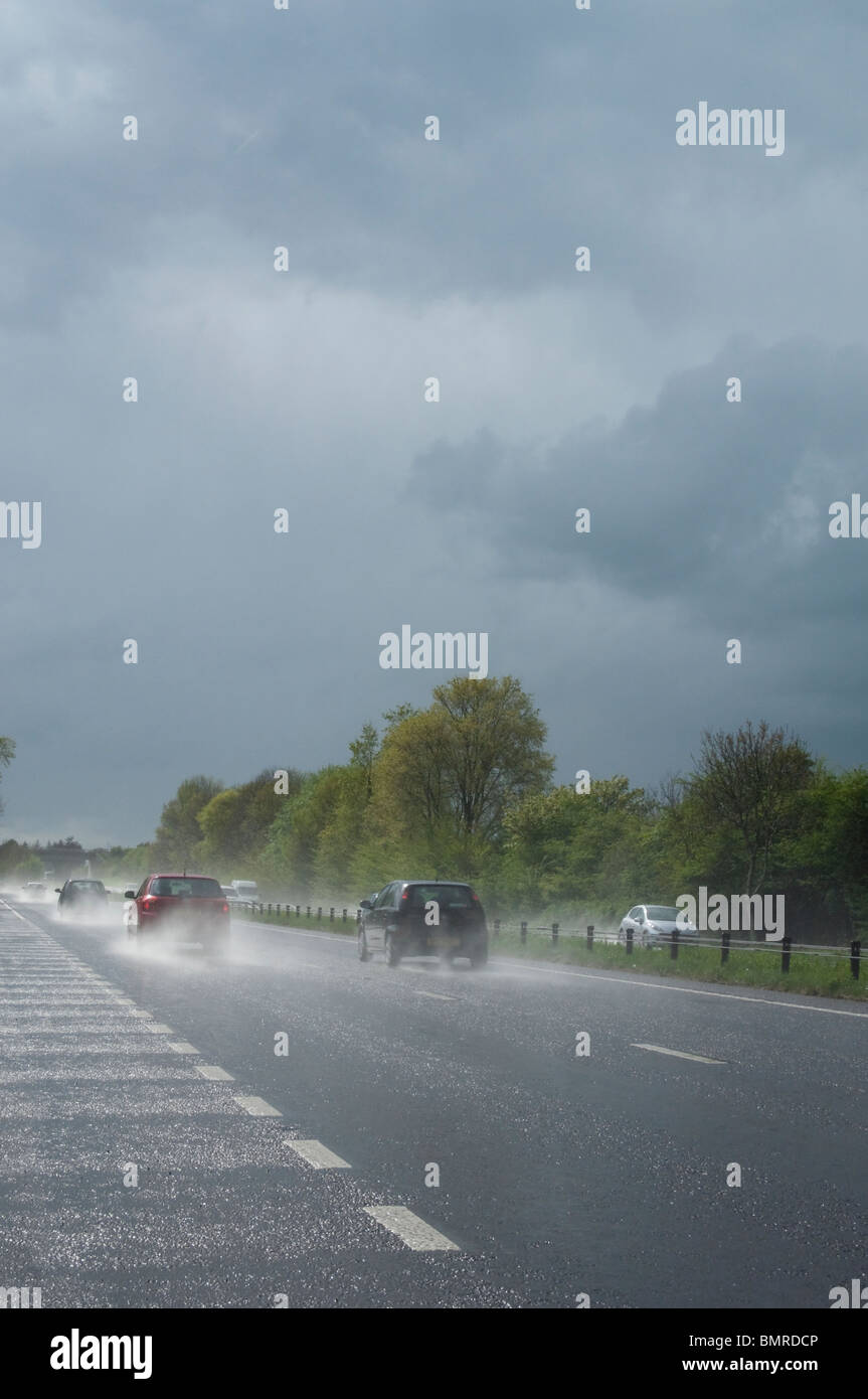 traffic on the A40 in Wales after a cloud burst Stock Photo