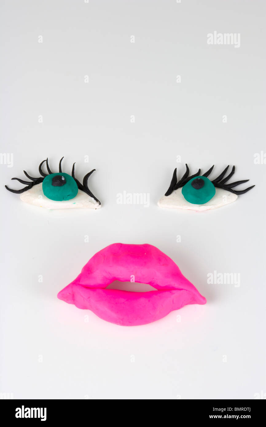 Plasticine figurines, Female face, eyes and lips Stock Photo Alamy
