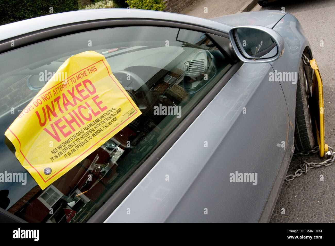 untaxed car tax road avoidance taxation enforcement clamp clamped cars